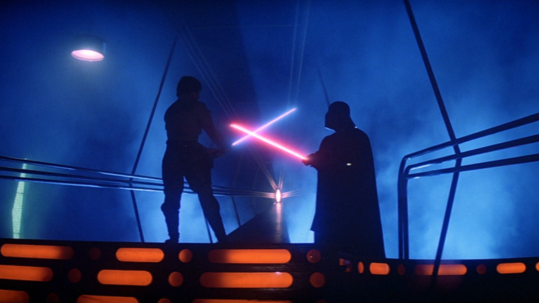 Luke and Darth Vader fighting with lightsabers in The Empire Strikes Back