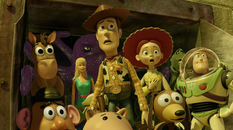 Woody Jessie Buzz and other toys looking scared in Toy Story 3