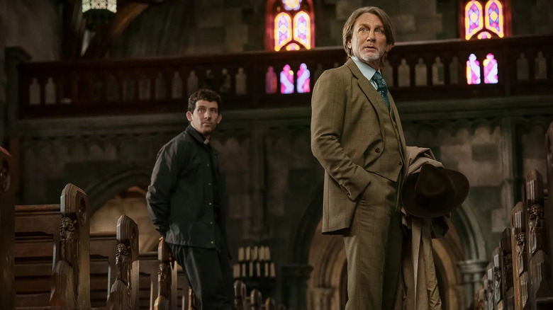 Jud and Benoit in the church in Wake Up Dead Man