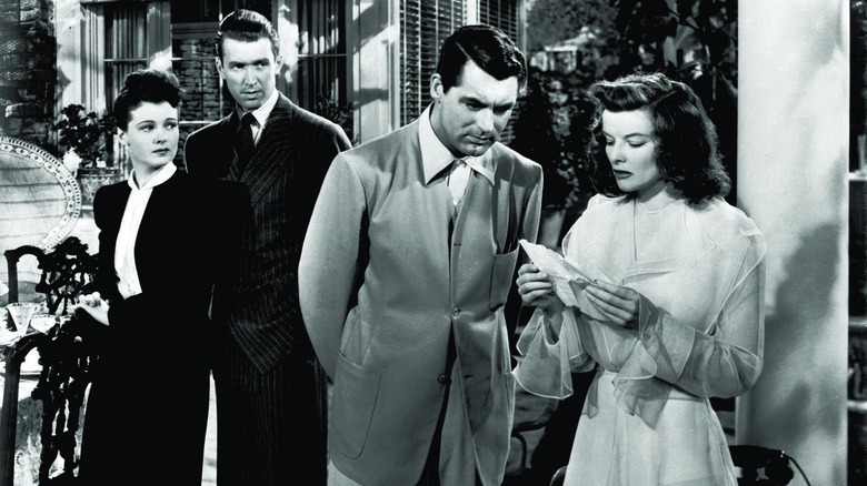 The Philadelphia Story's main characters inspecting a very important letter (1940)