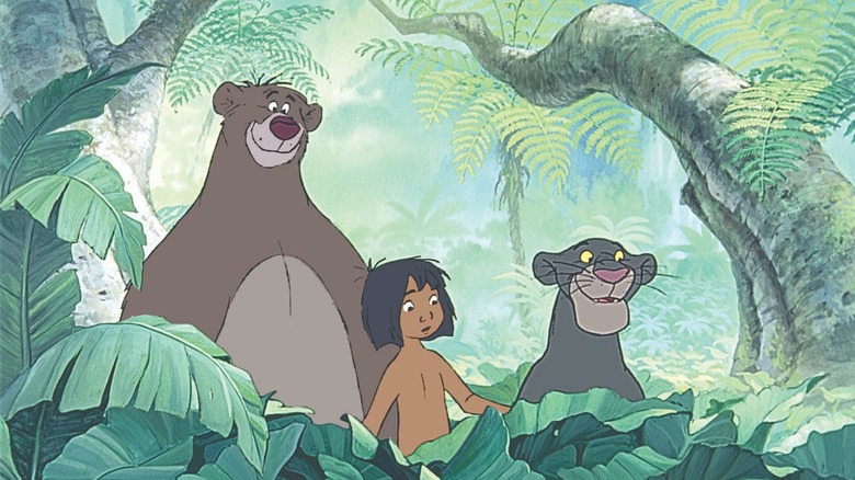Baloo, Mowgli, and Bagheera spotting a human girl in The Jungle Book (1967)