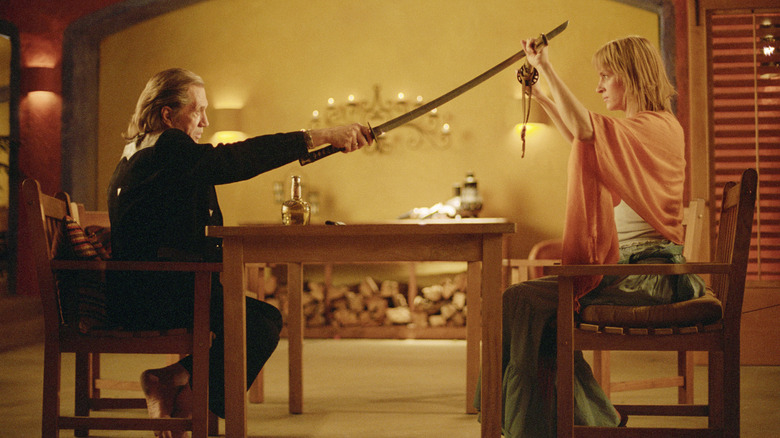 Bill and The Bride having a dinner table skirmish in Kill Bill: The Whole Bloody Affair (2025)