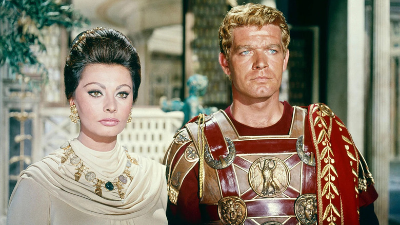 Boyd and Loren stand in Roman dress