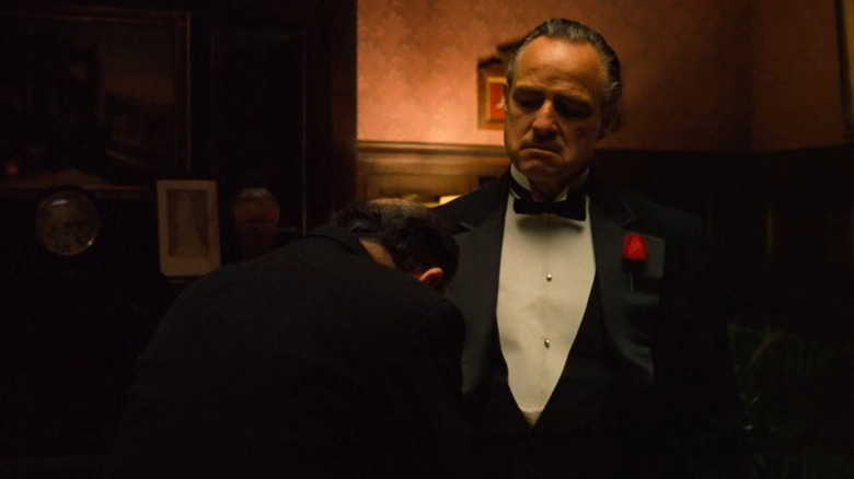 Vito Corleone being paid respect in The Godfather (1970)