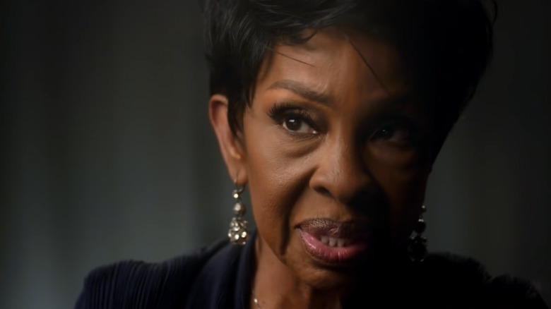 Glady Knight wearing dangling earrings