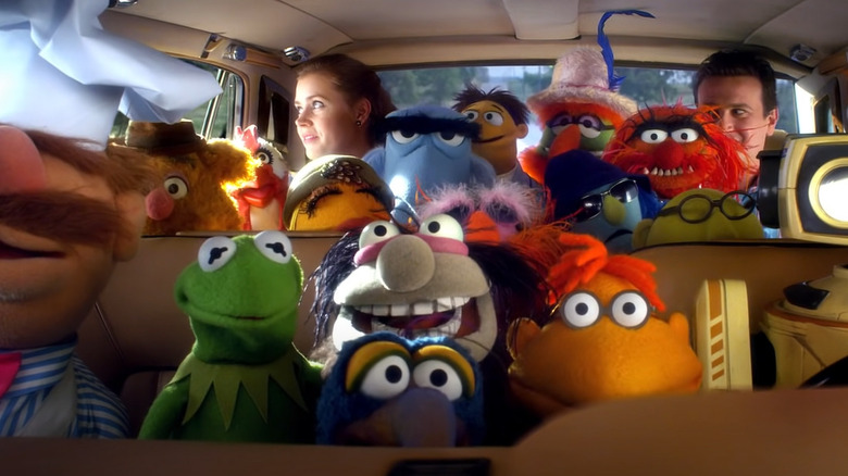 The Muppets piled in car