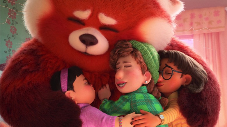 Red Panda Mei hugging friends
