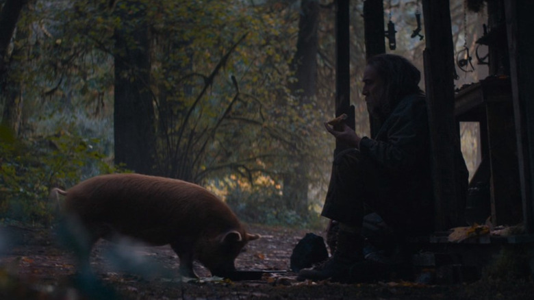 Nicolas Cage with pig