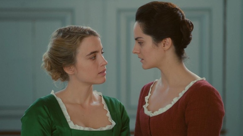 Noémie Merlant and Adèle Haenel staring