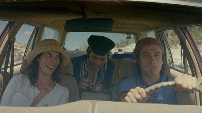 Luisa, Tenoch, and Julío enjoying themselves as they drive to Boca del Cielo