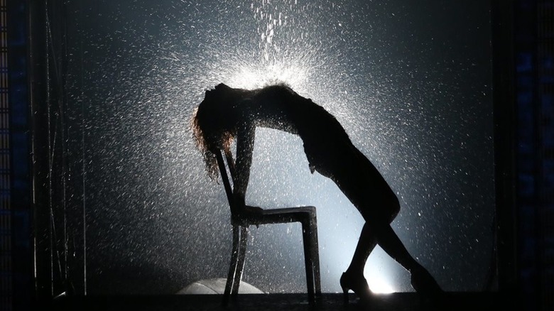 Alex is drenched in water while dancing in "Flashdance" (1983)