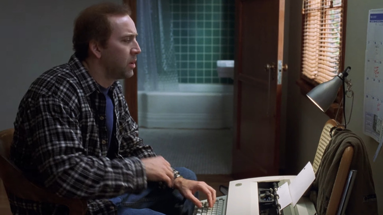 Charlie Kaufman sitting at his typewriter in "Adaptation" (2002)