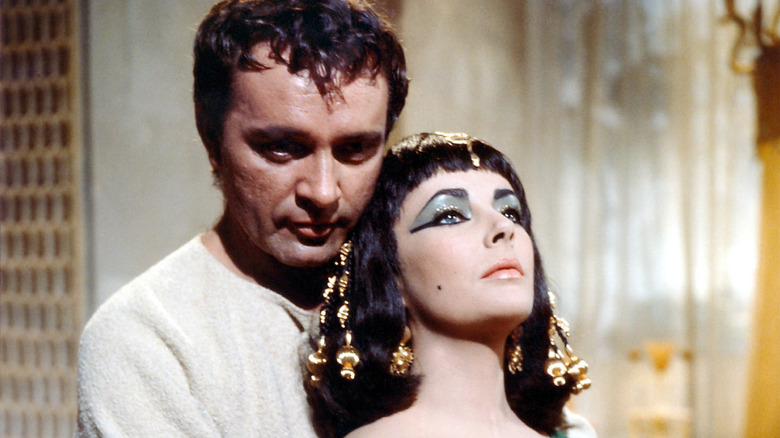 Mark Antony holds Cleopatra
