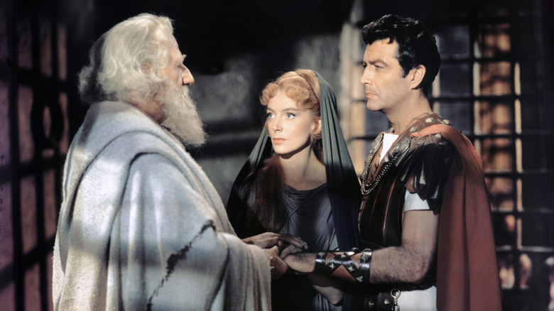 Marcus and Lygia listen to Saint Peter