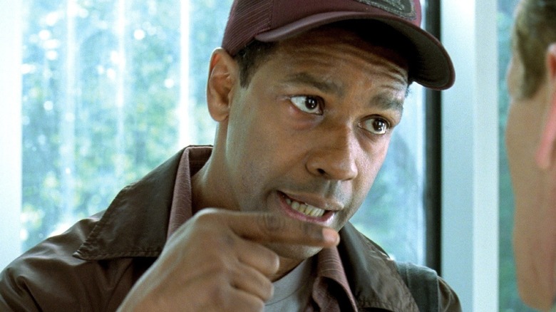 John pointing at an unseen man in "John Q." (2002)