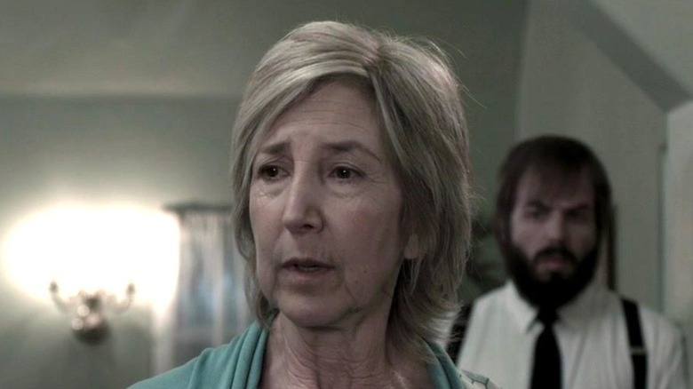 Elise Rainier speaking in a white room in Insidious