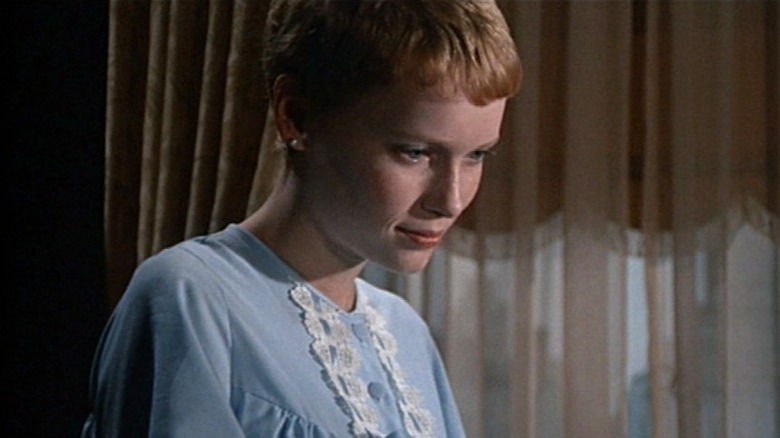 Rosemary Woodhouse wears a nightgown and smiles in Rosemary's Baby