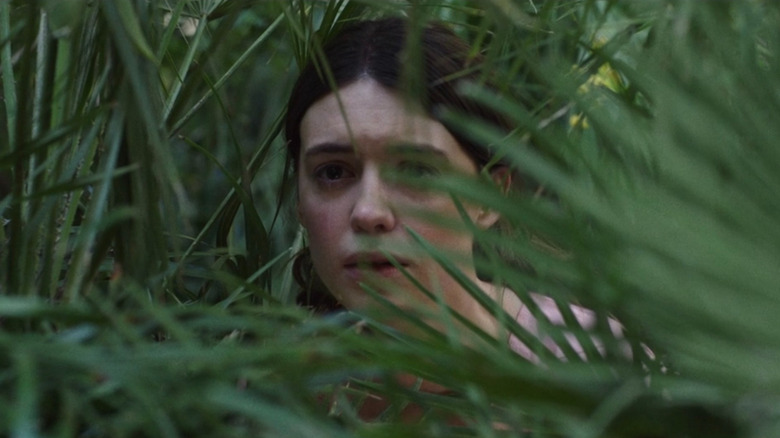 Kya hiding in the marsh
