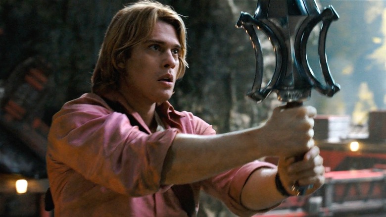 Prince Adam holding the Power Sword in 