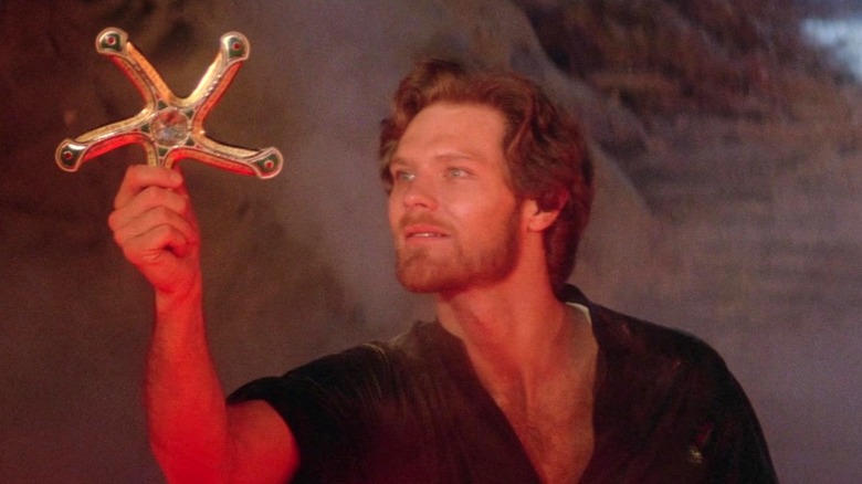 Prince Colwyn holding the Glaive in "Krull"