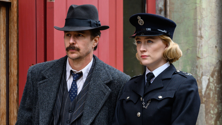 Inspector Stoppard and Constable Stalker standing outside