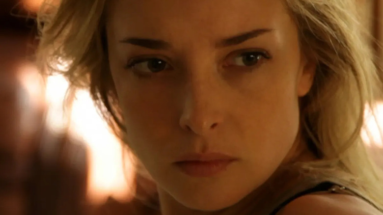 Em looking on, pensively