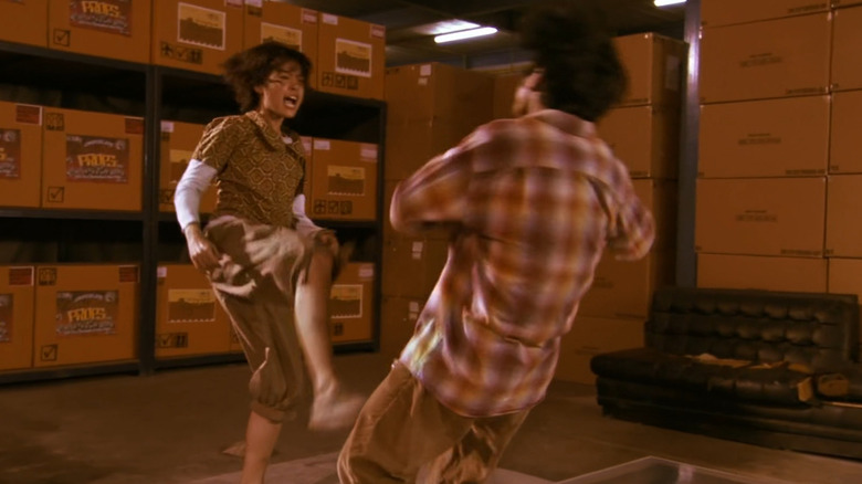 Zen kicking a man in "Chocolate" (2008)