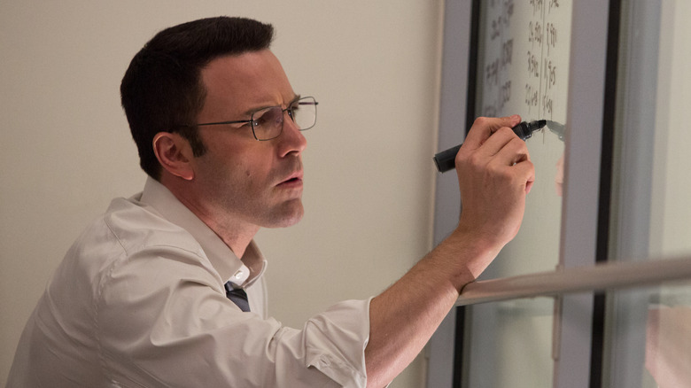 Christian Woolf calculating numbers in "The Accountant" (2016)