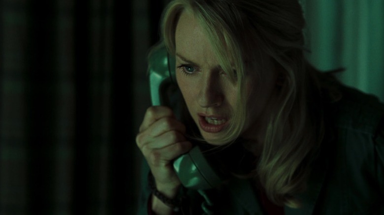 Rachel Keller talking on the phone with a concerned expression in The Ring