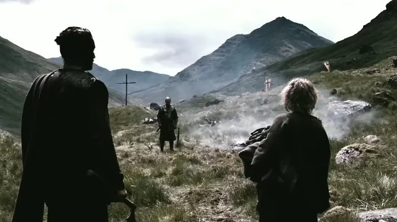 Men in a mountain valley in Valhalla Rising