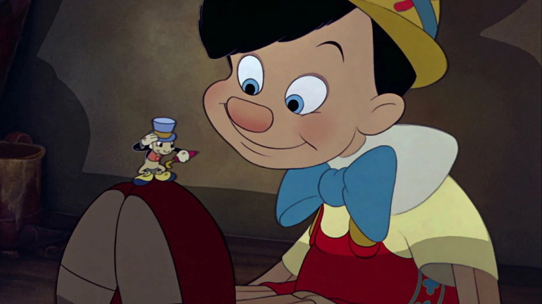 Pinocchio looking at Jiminy Cricket in Pinocchio (1940)