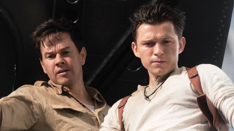 Sully and Nate prepare to drop from a cargo plane in Uncharted (2022)
