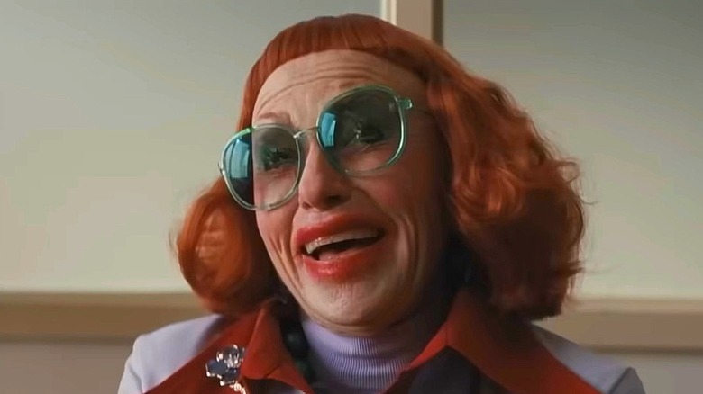 Gladys smiling in Weapons