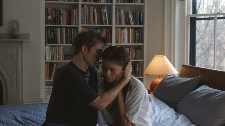Charlie whispering in Emma's deaf ear in The Drama