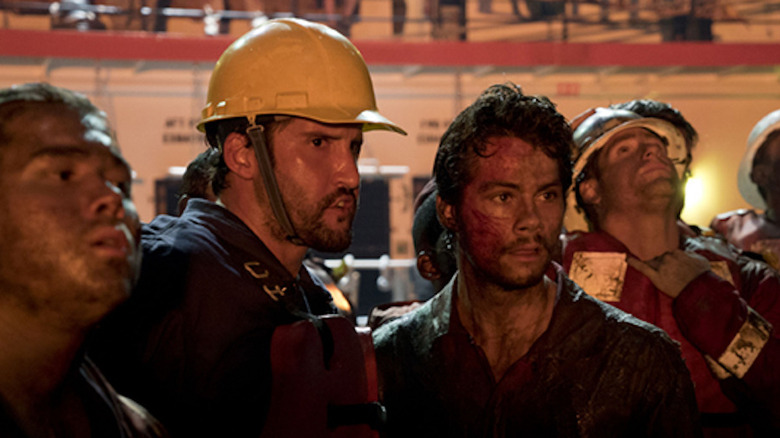 Caleb and the oil rig crew observe the disaster in "Deepwater Horizon" (2016)