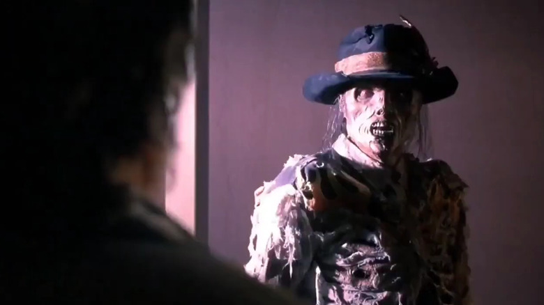 Elvis Presley looking at Bubba Ho-tep in "Bubba Ho-Tep"