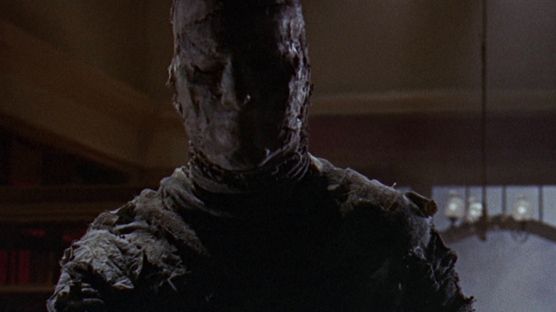Ra-Antef looking over the man he just killed in "The Curse of the Mummy's Tomb"