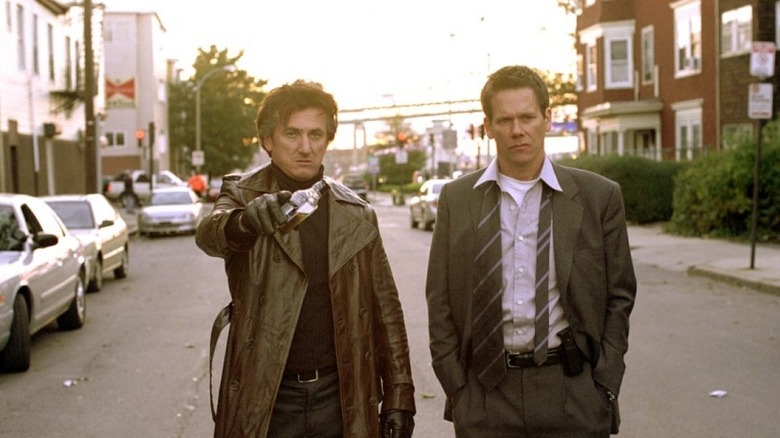 Sean Penn and Kevin Bacon in street