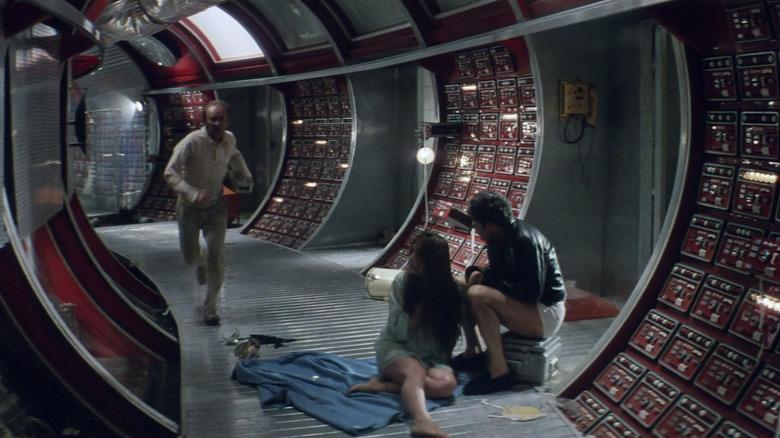 Man runs down circular hallway