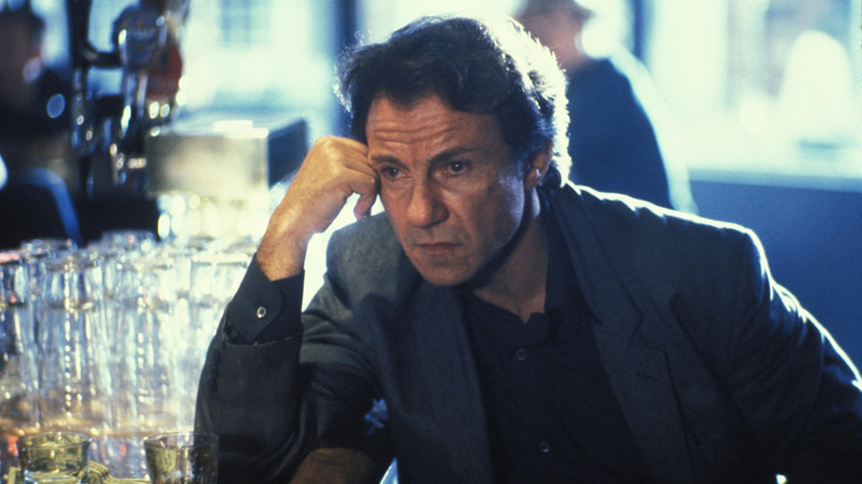 The Lieutenant sitting in bar looking distressed