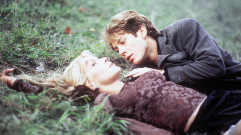 James and Catherine lay in grass