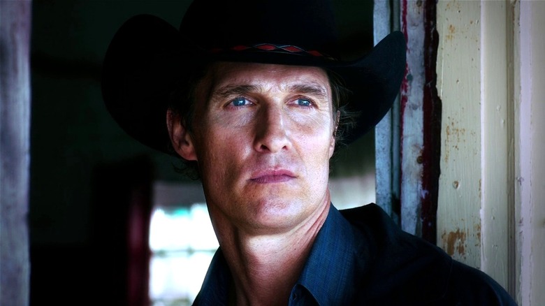 Killer Joe looking out of doorway