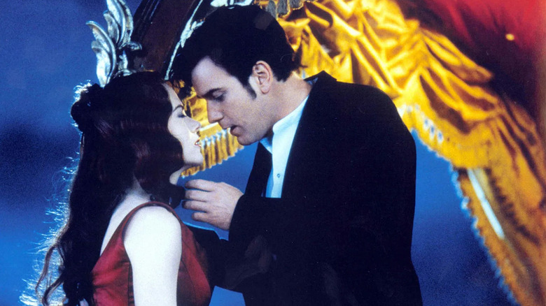 Ewan McGregor as Christian leaning in to kiss Nicole Kidman as Satine in Moulin Rouge! (2001)