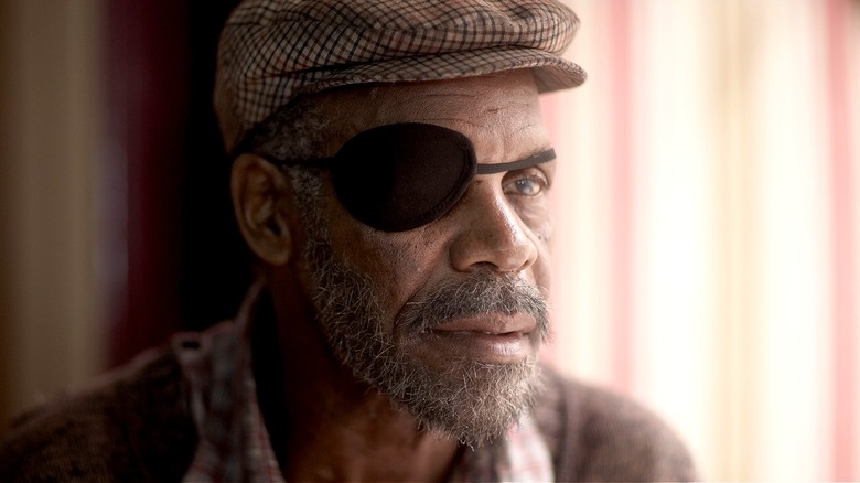 Man with Black Eye Patch looking thoughtful in Blindness