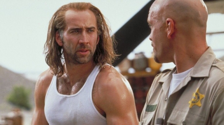 Cameron Poe talks to Cyrus 'The Virus' in 'Con Air' (1997)