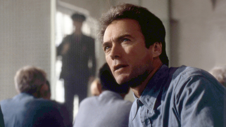 Frank Lee Morris sits in the prison commissary in 'Escape from Alcatraz' (1979)
