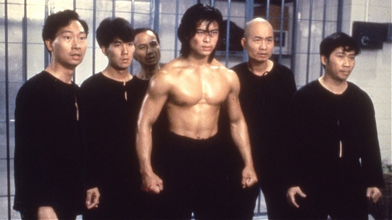 Ricky standing in front of inmates in Riki-Oh (1991)