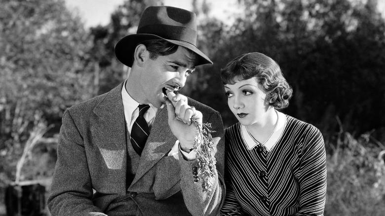 Ellie Andrews watches Peter Warne eat a carrot in It Happened One Night