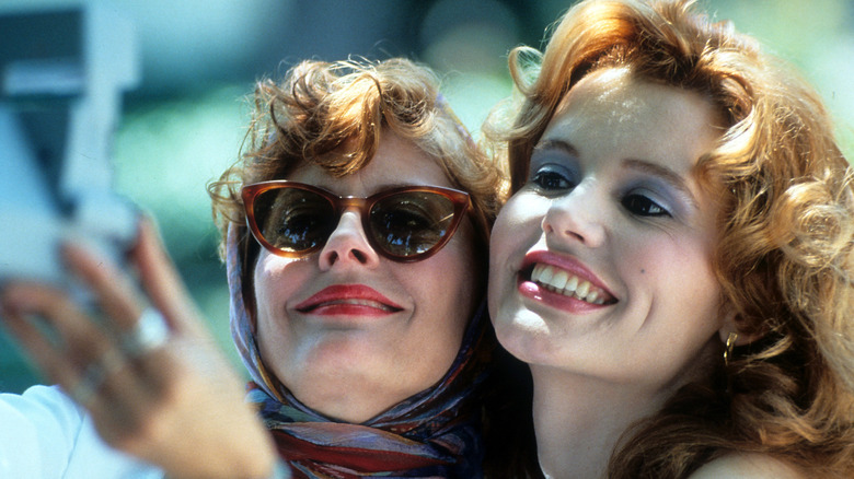 Thelma and Louise take a photo in Thelma & Louise