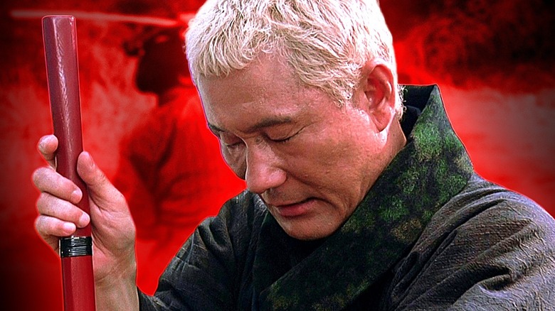 Zatoichi looking serene in Zatoichi with a red custom background
